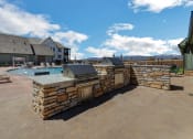 Thumbnail 31 of 38 - Pool and grilling station at Upland Flats, Colorado Springs, CO, 80922