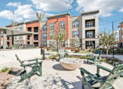Thumbnail 18 of 108 - Courtyard Firepit Patio at The Maddox Luxury Apartment Homes, Arizona, 85326 