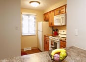 Thumbnail 19 of 36 - Townhome Kitchen  at Deauville Park Apartments, Monroeville, PA