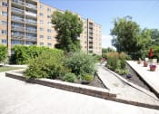 Thumbnail 24 of 32 - Garden & Patio Area at 1310 Archibald Apartments, Winnipeg, MB R2J 0Z4