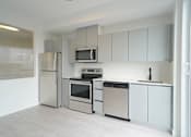 Thumbnail 59 of 77 - Kitchen With Modern Finishings at 703 St. Anne's Road Apartments, Winnipeg,MB