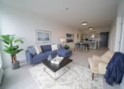 Thumbnail 27 of 77 - Spacious Living Area with Kitchen at 703 St. Anne's Road Apartments, Winnipeg, MB