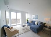 Thumbnail 28 of 77 - Spacious Living Room With Large Windows at 703 St. Anne's Road Apartments, Winnipeg, MB