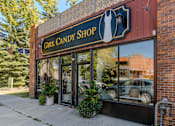 Thumbnail 35 of 40 - the front of a building with a sign that reads girl candy shop