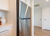 Thumbnail 9 of 47 - A stainless steel LG refrigerator in a kitchen.