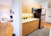 Thumbnail 5 of 32 - Refrigerator And Kitchen Appliances at 1310 Archibald Apartments, Winnipeg, MB R2J 0Z4
