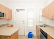 Thumbnail 6 of 16 - Kitchen at 573 Warsaw Apartments for rent in Winnipeg, MB