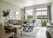 Thumbnail 6 of 74 - Neutral Colors Living Room With View at Harbor Heights 55+ Community, Olympia, Washington