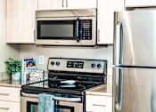 Thumbnail 18 of 25 - Mill City Apartments - Kitchen