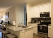 Thumbnail 6 of 25 - Kitchen at The Retreat at Sumter Apartments, Sumter, SC, 29150