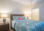 Thumbnail 13 of 25 - Bedroom with cozy bed at The Retreat at Sumter Apartments, Sumter, 29150
