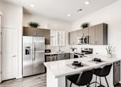 Thumbnail 3 of 18 - Gourmet Kitchen With Island at Avilla Camelback Ranch, Arizona