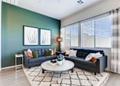 Thumbnail 5 of 15 - Living Room With Expansive Window at Avilla Centerra Crossings, Goodyear