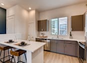Thumbnail 9 of 15 - Fully Equipped Eat-In Kitchen at Avilla Centerra Crossings, Goodyear, 85338