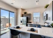 Thumbnail 4 of 15 - Gourmet Kitchen With Island at Avilla Centerra Crossings, Goodyear, Arizona