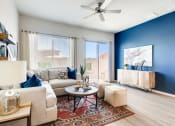 Thumbnail 6 of 16 - Living Room With Expansive Window at Avilla Meadows, Surprise, Arizona