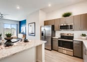 Thumbnail 8 of 16 - Fully Equipped Kitchen With Modern Appliances  at Avilla Meadows, Surprise, AZ, 85379