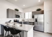 Thumbnail 4 of 16 - Gourmet Kitchen With Island at Avilla Meadows, Arizona, 85379