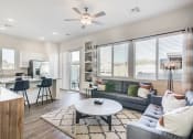 Thumbnail 12 of 24 - Living Room With Kitchen View at Avilla Gateway, Phoenix