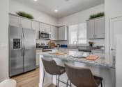 Thumbnail 5 of 12 - Gourmet Kitchen with Island at Avilla Enclave, Mesa, AZ 85212