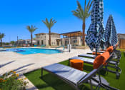 Thumbnail 10 of 12 - Poolside Lounge Area at Avilla Enclave, Mesa, AZ 85212
