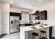 Thumbnail 1 of 13 - Gourmet Kitchen With Island at Avilla Lehi Crossing, Arizona, 85213