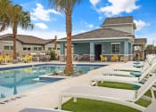 Thumbnail 14 of 15 - Poolside Relaxing Area at Avilla Suncoast, Odessa, 33556