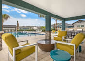 Thumbnail 8 of 12 - Outdoor Lounge Area at Avilla Cypress Creek, Sun City Center, FL 33573