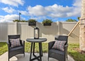 Thumbnail 10 of 12 - Private Backyard Sitting Area at Avilla Cypress Creek, Sun City Center, FL 33573