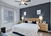 Thumbnail 7 of 10 - Bedroom with Expansive Windows at Avilla Berry Creek Highlands, Georgetown, TX 78633