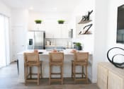 Thumbnail 3 of 9 - Gourmet Kitchen with Island at Avilla Broadway, Phoenix, AZ 85353