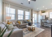 Thumbnail 2 of 15 - Living Room With Kitchen View at Avilla Suncoast, Odessa, FL, 33556