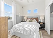 Thumbnail 11 of 19 - Secondary bedroom and spacious closets at Avilla Lakeridge in Arlington, TX 76002.