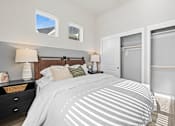 Thumbnail 10 of 19 - Secondary bedroom and spacious closets at Avilla Lakeridge in Arlington, TX 76002.