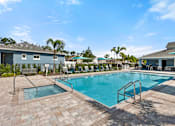 Thumbnail 8 of 16 - Resort Style Pool & Hot Tub at Avilla Cypress Creek, Sun City Center, FL 33573