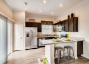 Thumbnail 3 of 14 - Gourmet Kitchen With Island at Avilla Northside, McKinney, 75071