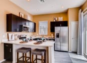 Thumbnail 11 of 12 - Gourmet Kitchen With Island at Avilla Deer Valley, Phoenix