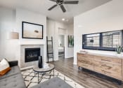 Thumbnail 1 of 13 - Living Room With Television at Avilla Buffalo Run, Colorado