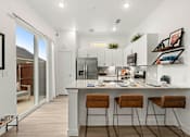 Thumbnail 15 of 23 - Gourmet Kitchen with Island at Avilla Railhead, Cleburne, TX 76033