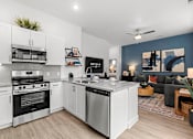 Thumbnail 17 of 23 - Kitchen and Living Area at Avilla Railhead, Cleburne