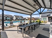 Thumbnail 10 of 23 - Outdoor Lounge + Grill Area at Avilla Railhead, Cleburne, TX 76033