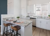 Thumbnail 3 of 12 - Gourmet Kitchen with Island at Avilla Palomino, Glendale, AZ 85302