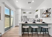 Thumbnail 10 of 17 - Gourmet Kitchen with Island at Avilla Marigold, Buckeye, AZ 85396