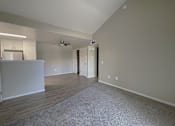 Thumbnail 37 of 41 - Carpeted Living Area at Sharlands Terrace Apartments, Nevada