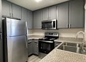 Thumbnail 28 of 41 - Fully Equipped Kitchen at Sharlands Terrace Apartments, Reno, 89523