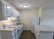 Thumbnail 29 of 31 - Kitchen with bar at The Fountains Apartments, Pensacola, FL