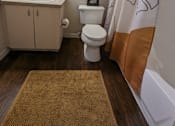 Thumbnail 27 of 31 - a bathroom with a toilet and a sink and a shower at Tivoli Apartments of Orlando, Oviedo, Florida