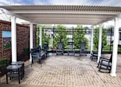 Thumbnail 4 of 6 - Courtyard With Ample Sitting at Spring Arbor of Fredericksburg, Fredericksburg, 22407