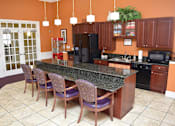 Thumbnail 2 of 11 - Granite Counter Tops In Kitchen at Spring Arbor Senior Living, Spring Arbor of Greensboro, Greensboro, NC