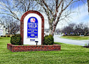 Thumbnail 1 of 13 - Apartment Community Entrance at Spring Arbor of Greenville in Greenville, NC